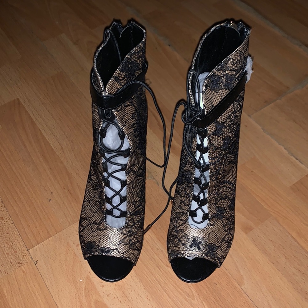 Heeled peep toe booties